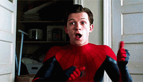 A Man In A Spiderman Costume Is Giving A Thumbs Up Sign GIF