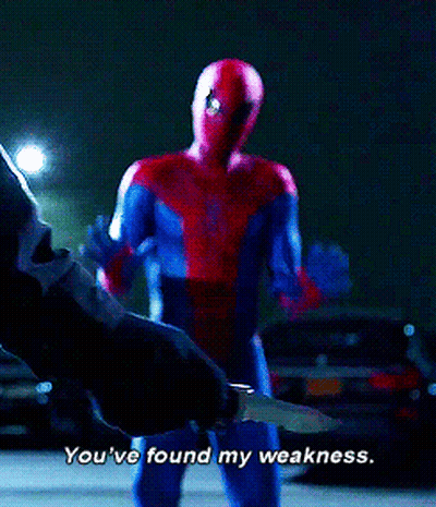 A Man In A Spiderman Costume Is Holding A Knife And Says You 'Ve Found My Weakness GIF