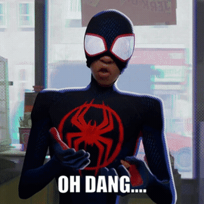 A Man In A Spiderman Costume Is Holding A Red Phone With The Words Oh Dang Written On It GIF