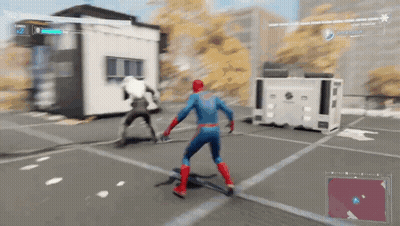 A Man In A Spiderman Costume Is Playing A Video Game . GIF