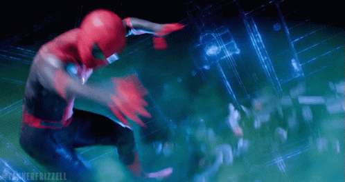 A Man In A Spiderman Suit Is Flying Through The Air GIF