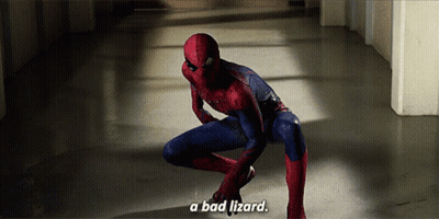 A Man In A Spiderman Suit Is Kneeling Down And Says " A Bad Lizard " GIF