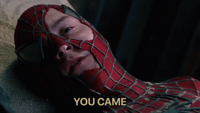 A Man In A Spiderman Suit Is Laying On The Ground With The Words " You Came " Below Him GIF