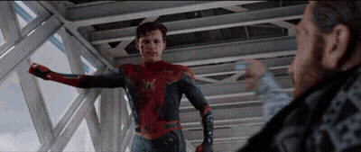 A Man In A Spiderman Suit Is Standing Next To A Man In A Black Shirt . GIF