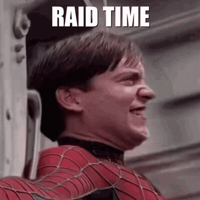 A Man In A Spiderman Suit Is Standing Next To A Wall With The Words `` Raid Time '' Written On The Bottom . GIF