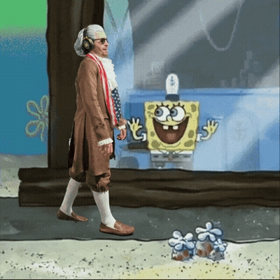 A Man In A Spongebob Costume Stands In Front Of A Spongebob Drawing GIF