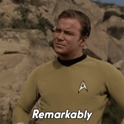 A Man In A Star Trek Uniform Is Making A Funny Face And Says Remarkably GIF