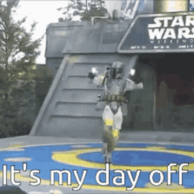 A Man In A Star Wars Costume Is Dancing In Front Of A Sign That Says It 'S My Day Off GIF