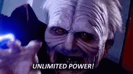 A Man In A Star Wars Mask Is Holding A Blue Light And Says `` Unlimited Power ! '' GIF