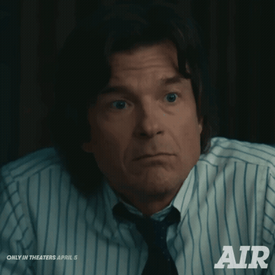 A Man In A Striped Shirt And Tie Is Advertising Air GIF