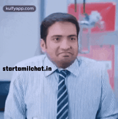 A Man In A Striped Shirt And Tie Making A Funny Face GIF