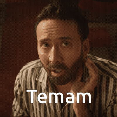 A Man In A Striped Shirt Has The Word Temam Written On His Face GIF