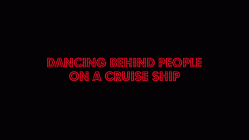 A Man In A Striped Shirt Is Dancing In A Restaurant With Other People GIF