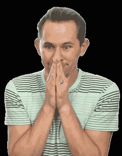 A Man In A Striped Shirt Is Praying With His Hands Together GIF