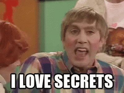 A Man In A Striped Shirt Is Screaming And Saying `` I Love Secrets '' . GIF