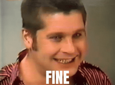 A Man In A Striped Shirt Is Smiling With The Word Fine On His Face GIF