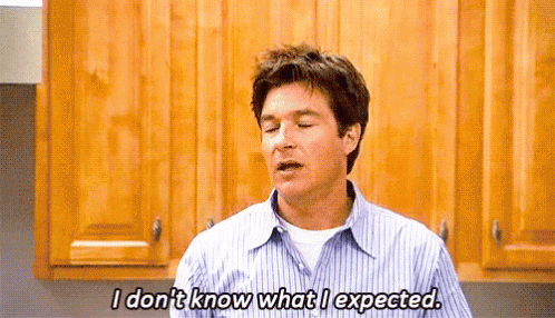 A Man In A Striped Shirt Is Standing In A Kitchen And Saying `` I Don T Know What I Expected . `` GIF