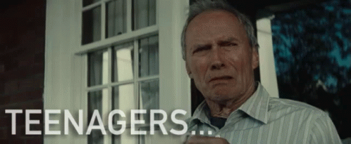 A Man In A Striped Shirt Is Standing In Front Of A Window With The Word Teenagers Written On The Bottom GIF