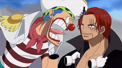 A Man In A Striped Shirt Is Standing Next To A Clown In A Pirate Costume . GIF
