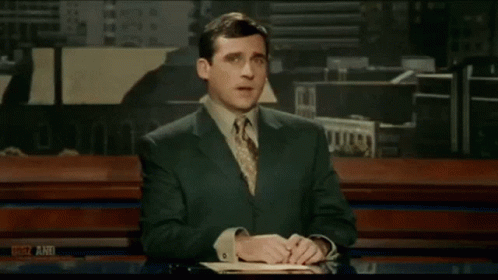 A Man In A Striped Shirt Is Standing With His Arms Crossed In Front Of A Window With The Word Creations On The Bottom GIF