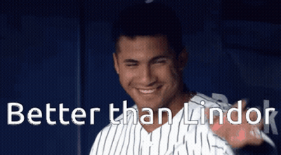 A Man In A Striped Shirt With The Words Better Than Lindor Behind Him GIF