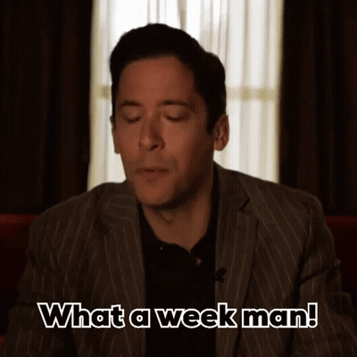 A Man In A Striped Suit Says What A Week Man GIF