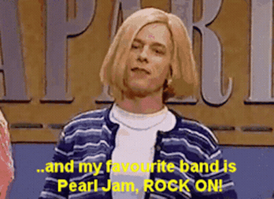 A Man In A Striped Sweater Is Talking About Pearl Jam GIF