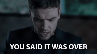 A Man In A Suit And Black Shirt Is Saying You Said It Was Over . GIF