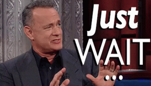 A Man In A Suit And Black Shirt Says Just Wait GIF