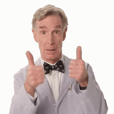 A Man In A Suit And Bow Tie Is Giving A Thumbs Up GIF
