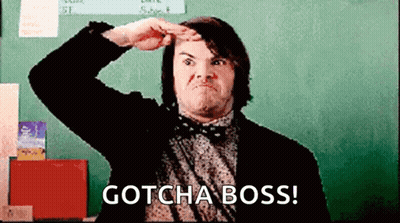 A Man In A Suit And Bow Tie Is Saluting In Front Of A Blackboard And Says Gotcha Boss ! GIF