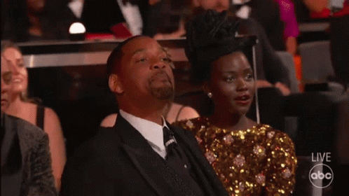 A Man In A Suit And Bow Tie Says Jada Jada Jada !!! GIF
