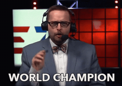 A Man In A Suit And Bow Tie Says " World Champion " GIF