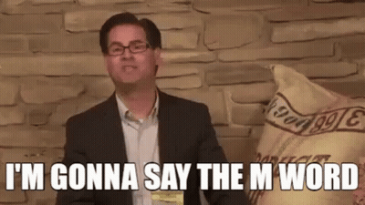 A Man In A Suit And Glasses Is Saying `` I 'M Gonna Say The M Word '' GIF