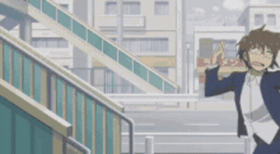 A Man In A Suit And Glasses Is Walking Down A Set Of Stairs . GIF