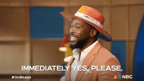 A Man In A Suit And Hat Is Smiling And Says Immediately Yes Please GIF