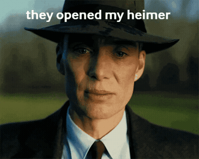A Man In A Suit And Hat With The Words They Opened My Heimer On The Bottom GIF
