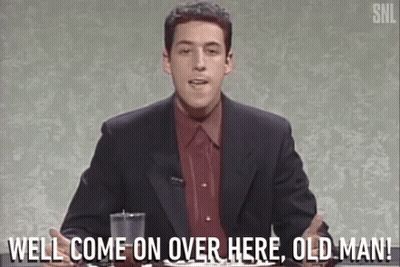A Man In A Suit And Red Shirt Says Well Come On Over Here Old Man . GIF