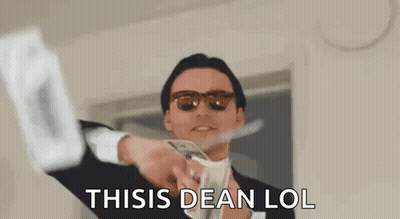A Man In A Suit And Sunglasses Is Throwing A Bunch Of Money In The Air And Saying `` This Is Dean Lol '' . GIF