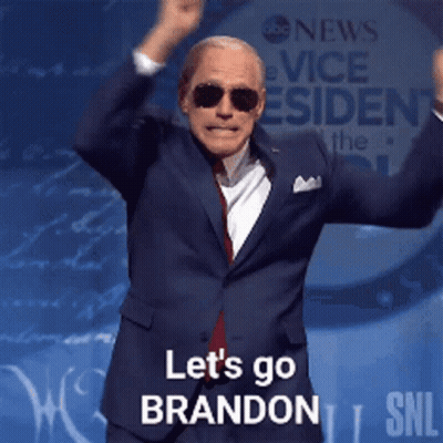 A Man In A Suit And Sunglasses Says Let 'S Go Brandon On Snl GIF