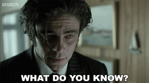 A Man In A Suit And Tie Asks What Do You Know GIF