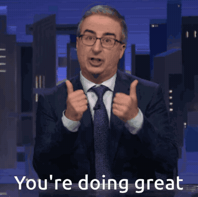 a man in a suit and tie giving a thumbs up with the words you 're doing great written below him
