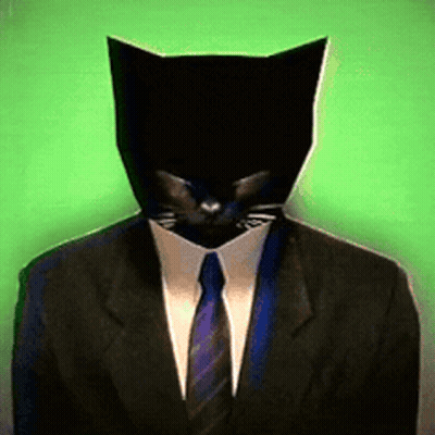 A Man In A Suit And Tie Has A Cat Mask On His Head GIF