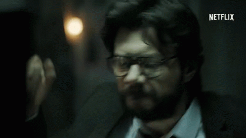 A Man In A Suit And Tie Has Netflix Written On The Bottom Right GIF