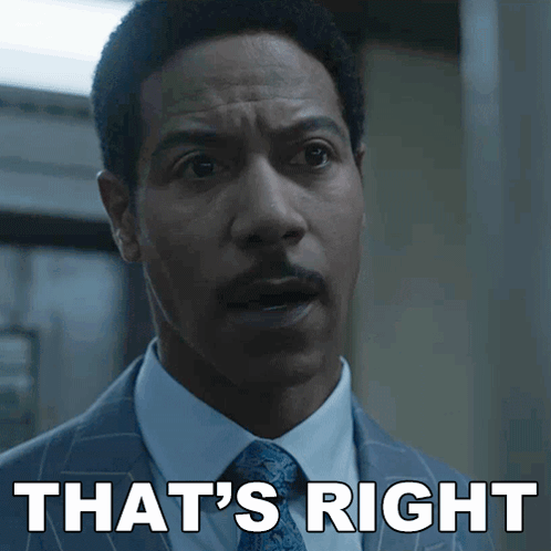 A Man In A Suit And Tie Has The Words That 'S Right On His Face GIF