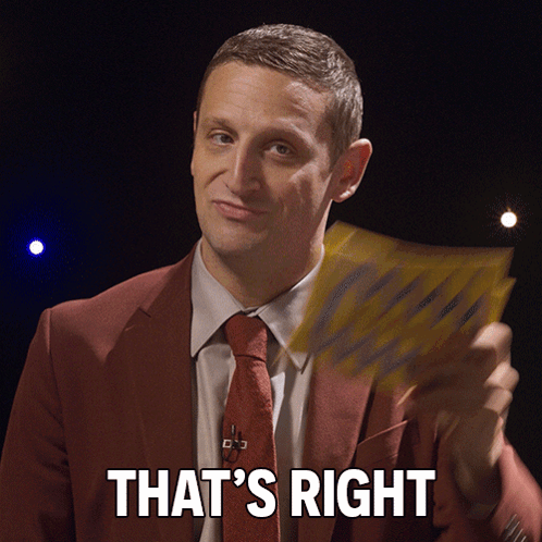 A Man In A Suit And Tie Holds A Piece Of Paper And Says " That 'S Right " GIF