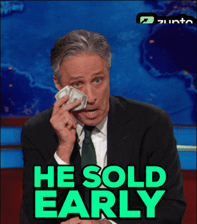 A Man In A Suit And Tie Holds A Pile Of Money In Front Of A Sign That Says " He Sold Early " GIF