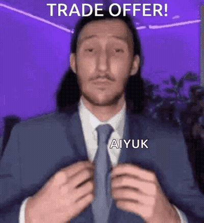A Man In A Suit And Tie Is Adjusting His Tie And Says Trade Offer ! Aiyuk GIF