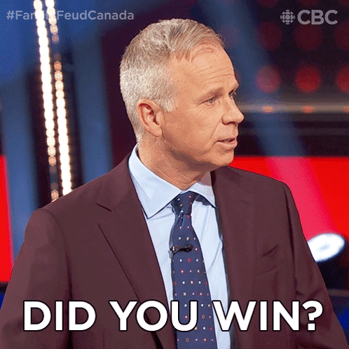 A Man In A Suit And Tie Is Asking If He Won GIF