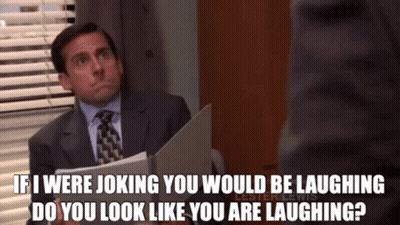A Man In A Suit And Tie Is Asking If He Would Be Laughing If He Were Joking GIF